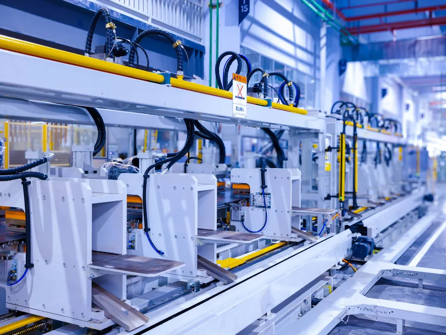 Worker at a factory machine